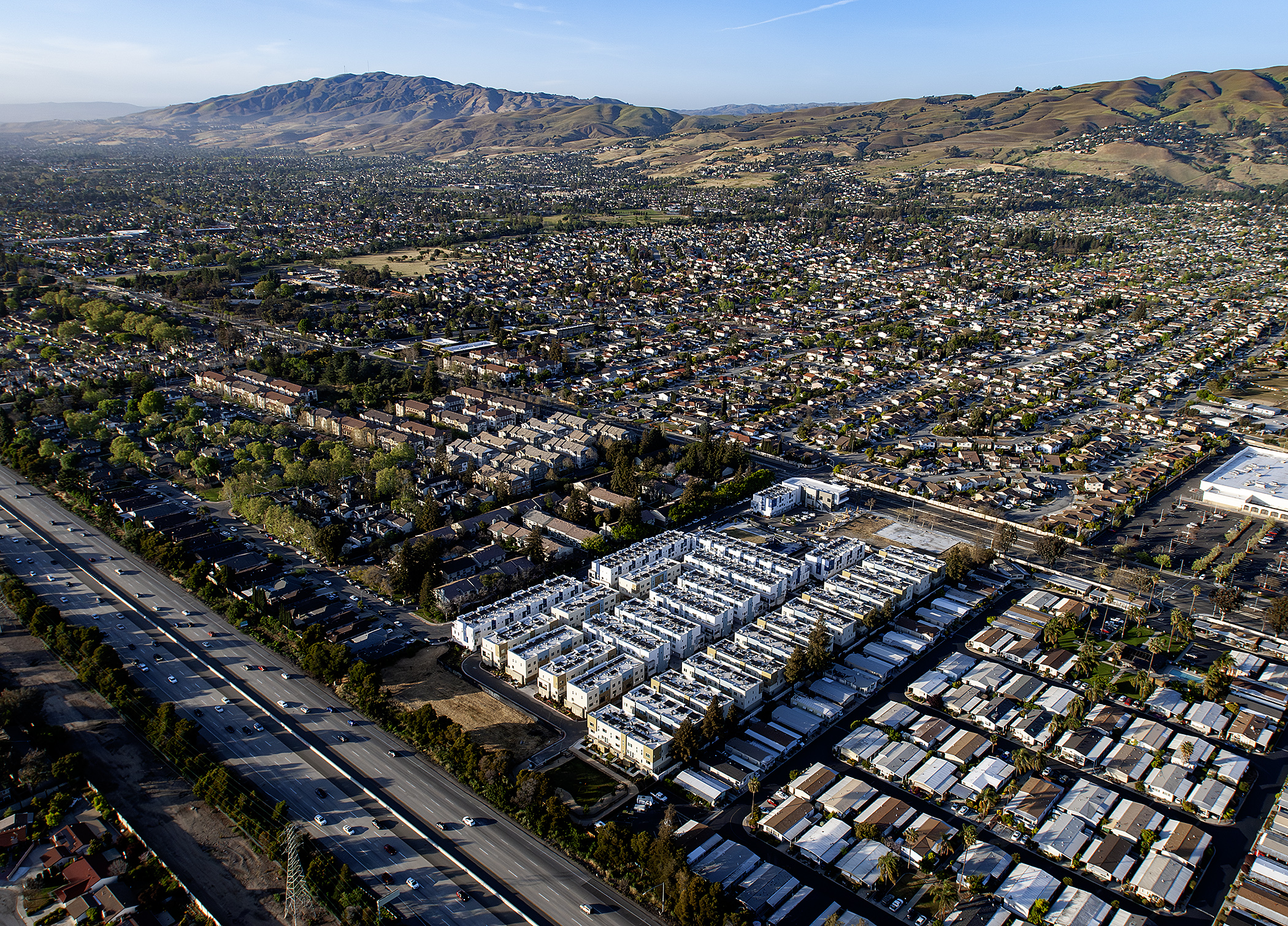 Aerial view of a commercial property within a Bay Area neighborhood