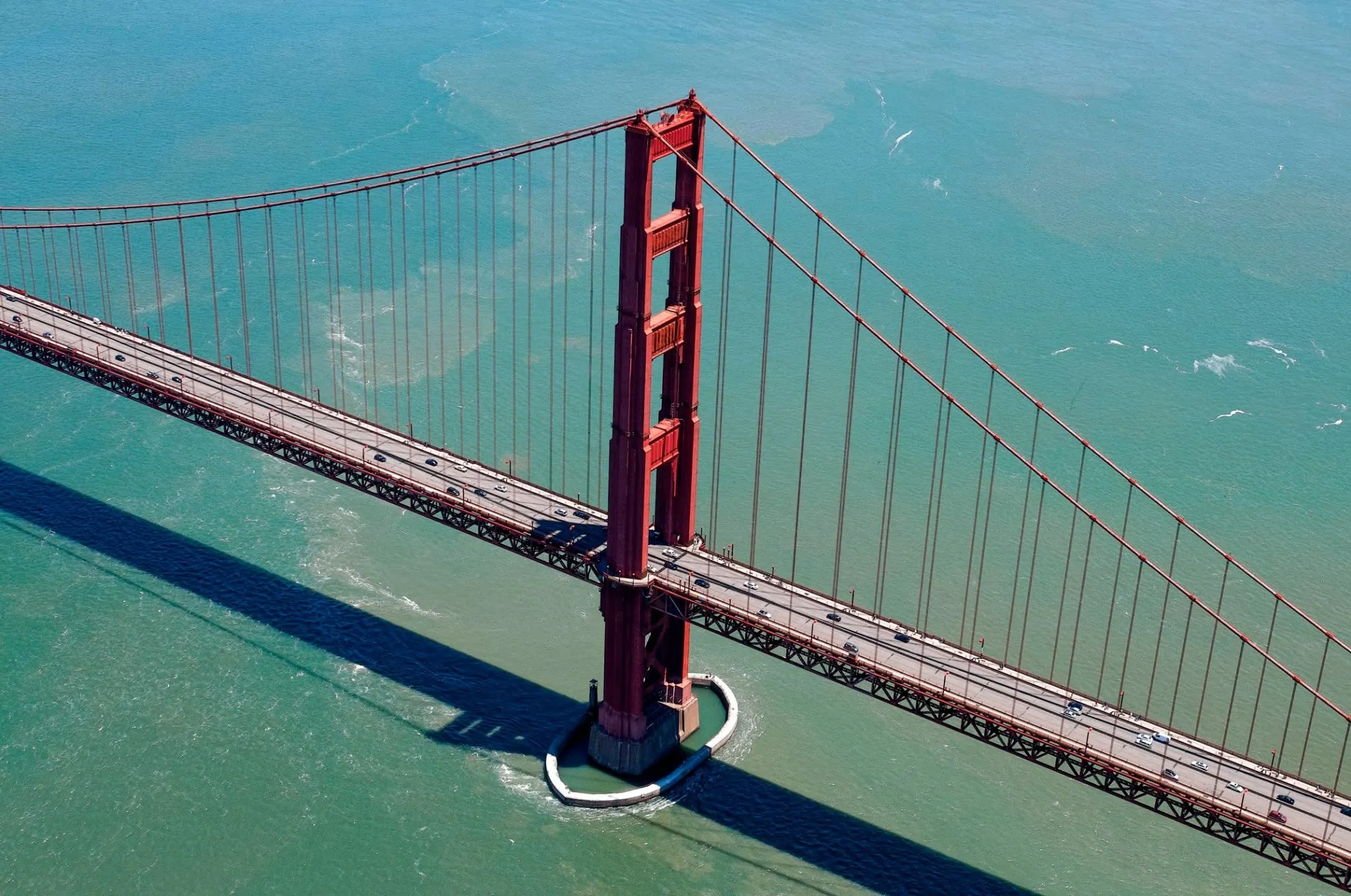 Aerial photograph of the Golden Gate Bridge spanning San Francisco Bay