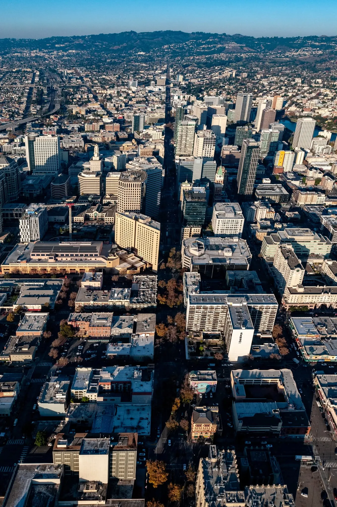 Vertical aerial view down Broadway through downtown Oakland