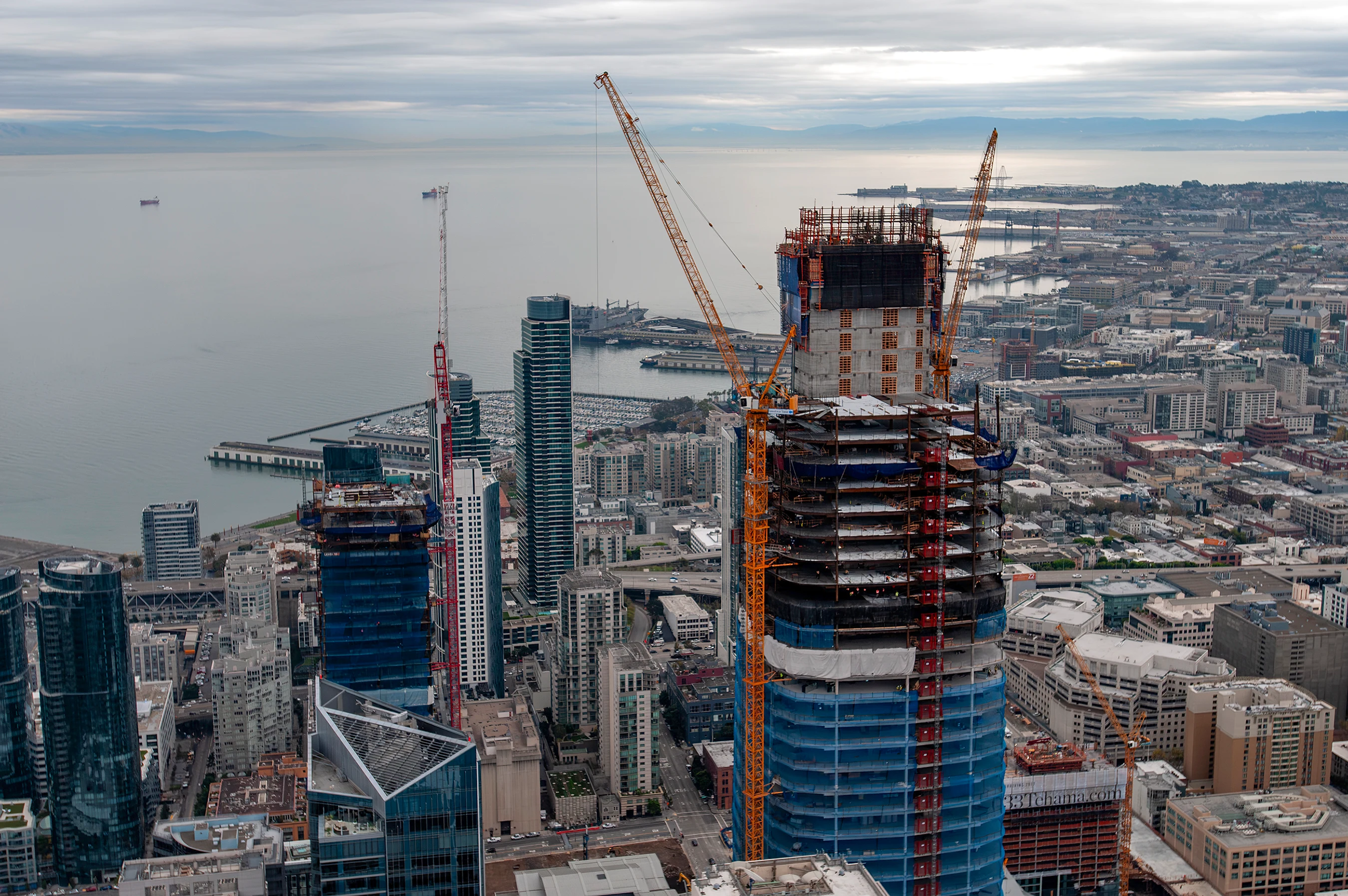San Francisco high-rises under construction with cranes above the skyline