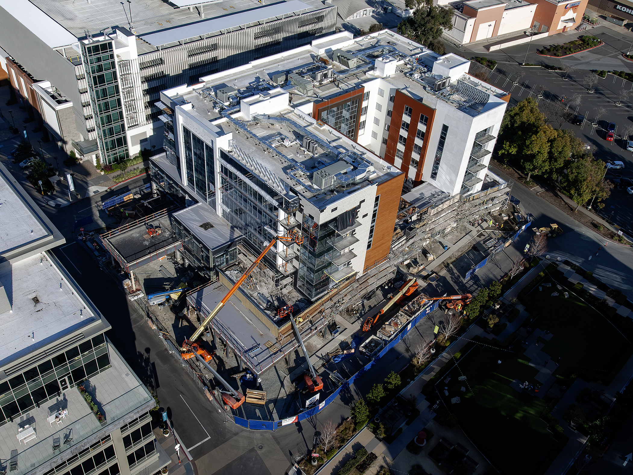 Aerial photograph of an active multi-story construction project